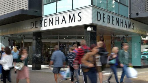 DEBENHAMS POSTS RECORD LOSSES